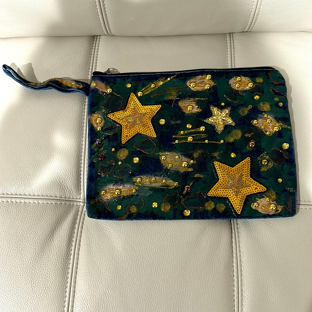 Clutch painted handbag